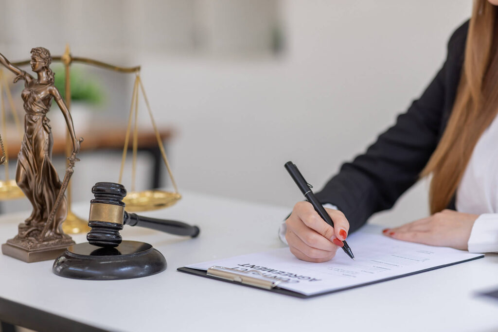 A notary public reviewing a checklist with a client before signing documents in Stockton, CA.